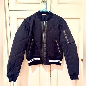 Black Bomber Jacket.. Very warm!
Size Med.